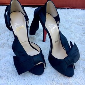 Christian Louboutin Bow T Dorset 100 mm black satin heels.